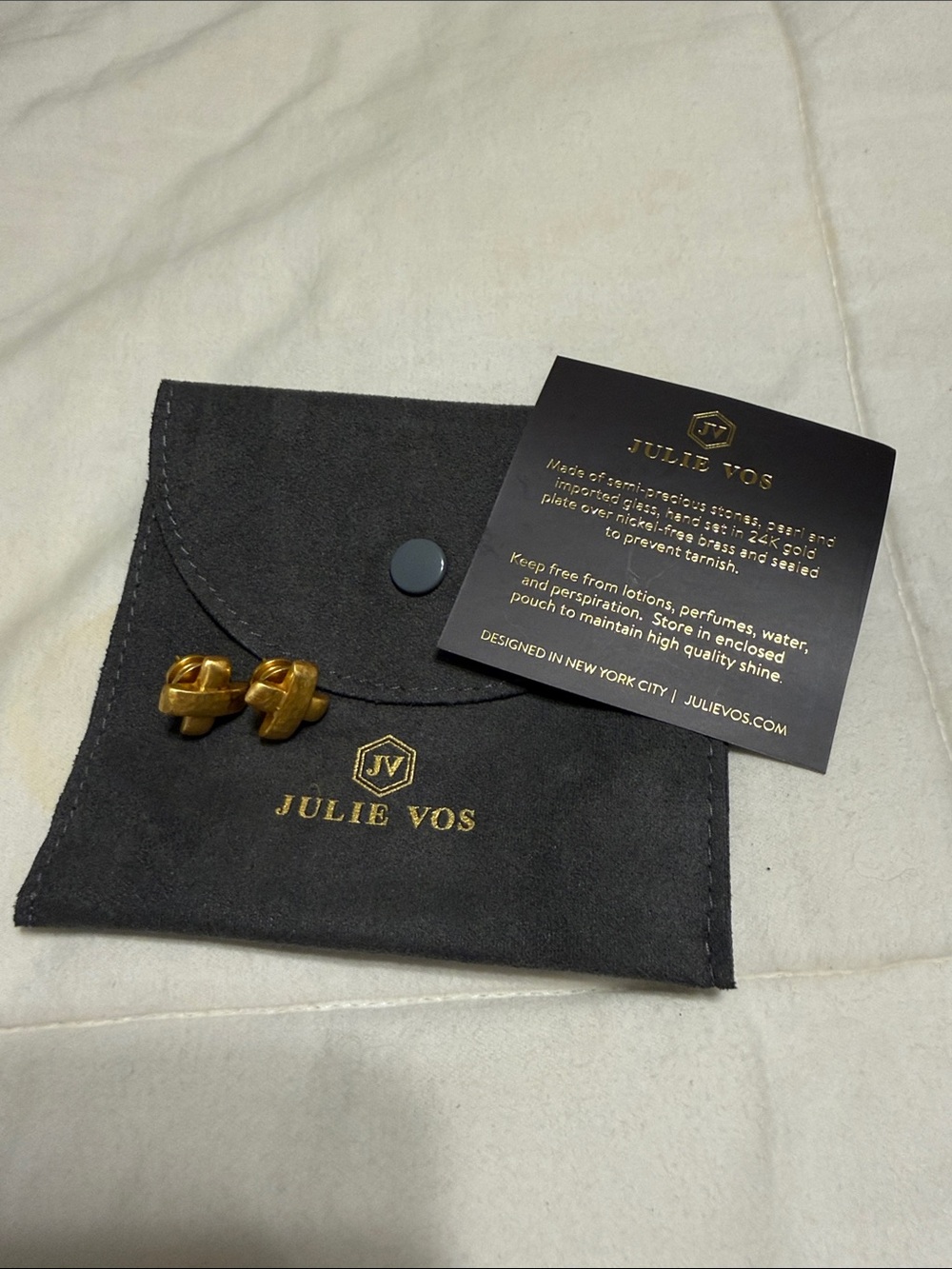 Julie Vos Gold Knot Stud Earrings on Branded Pouch